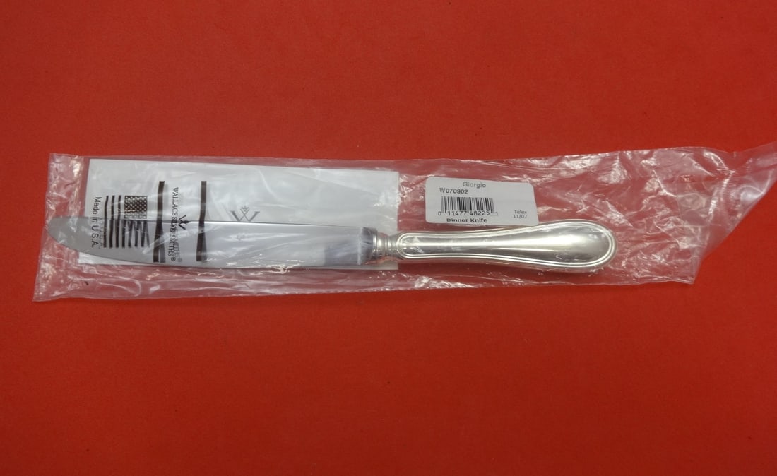 Wallace Italy Giorgio Sterling Silver Dinner Knife 10 1/4 Inch New: Wallace Italy Giorgio Sterling Silver Dinner Knife 10 1/4 Inch New This exquisite dinner knife is part of the Giorgio pattern by Wallace-Italy. Crafted with a sterling silver hollow handle and a durab