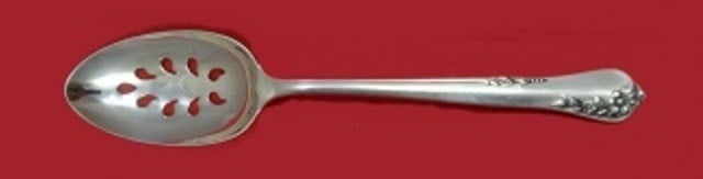 Oneida Engagement Sterling Silver Slotted Spoon 8 1/4" Custom Design: Oneida Engagement Sterling Silver Slotted Spoon 8 1/4" Custom Design This exquisite serving spoon from Oneida's Engagement pattern is crafted from high-quality sterling silver. Featuring a slotted des