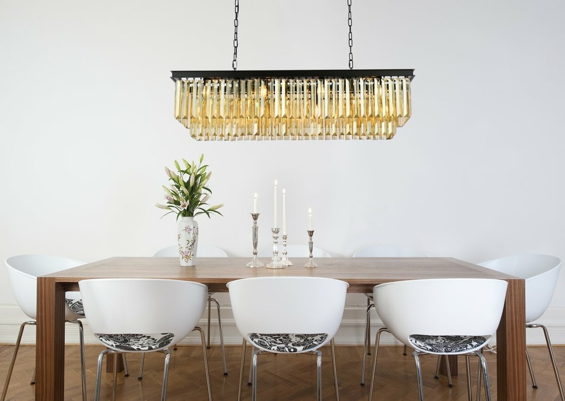 Sydney 12 Light Crystal Chandelier Matte Black 50 in: Sydney 12 Light Crystal Chandelier Matte Black 50 in Modern 12-light chandelier with a matte black finish and golden teak crystal accents. It is hardwired, height-adjustable, and designed for indoor i