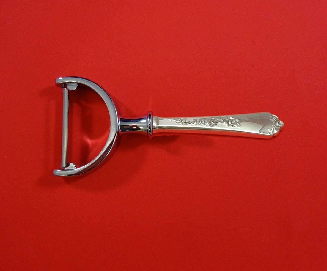 Wallace Sterling Rose vegetable peeler sterling silver 6 inch: Wallace Sterling Rose vegetable peeler sterling silver 6 inch A Sterling Rose by Wallace vegetable peeler with a sterling silver hollow handle and stainless implement. It is custom made and measures 6