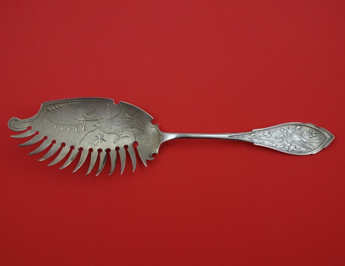 Wood & Hughes Japanese Sterling Silver Macaroni Server with Bird 10 3/8: Wood & Hughes Japanese Sterling Silver Macaroni Server with Bird 10 3/8 Enhance your dining experience with this exquisite Macaroni Server from the Japanese pattern by Wood & Hughes, crafted in sterli
