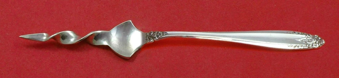 International Sterling Silver Prelude Butter Pick 5 3/4" Twisted Design: International Sterling Silver Prelude Butter Pick 5 3/4" Twisted Design This exquisite butter pick features the classic Prelude pattern by International Sterling. Crafted from high-quality sterling si