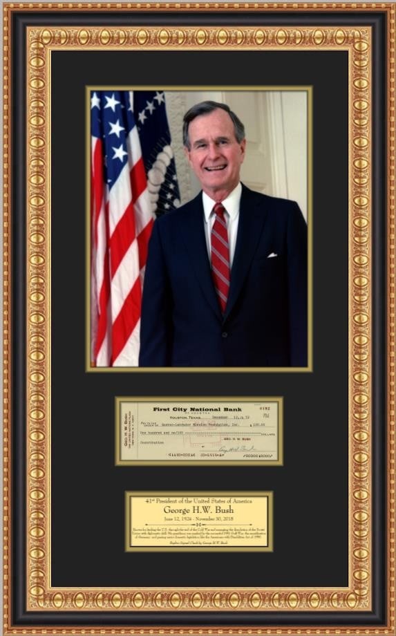 George H.W. Bush Replica Signed Check and Portrait Framed Display: George H.W. Bush Replica Signed Check and Portrait Framed Display This display features a facsimile signed check by President George H.W. Bush, custom framed alongside an 11" x 14" color portrait and 