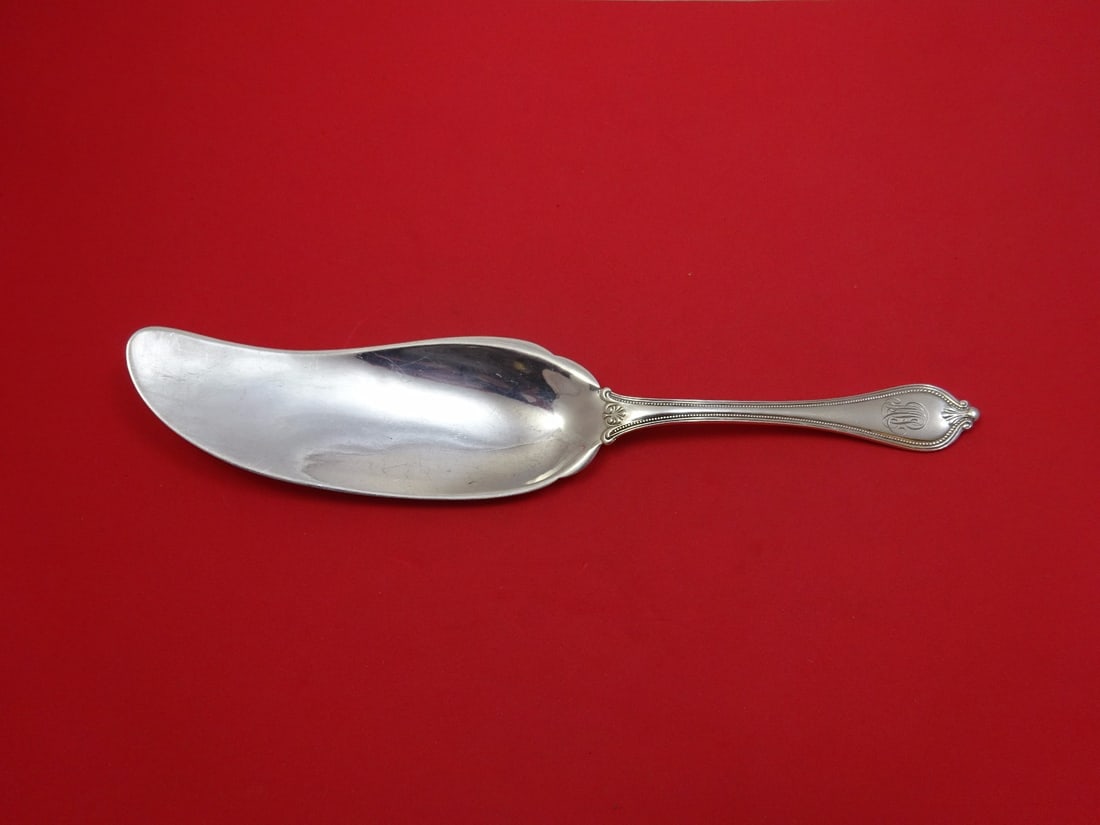 Towle Old Newbury Sterling Silver Fish Server 12 Inch Monogrammed: Towle Old Newbury Sterling Silver Fish Server 12 Inch Monogrammed Experience the timeless elegance of the Old Newbury by Towle Sterling Silver Fish Server, measuring 12 inches. This exquisite piece sh