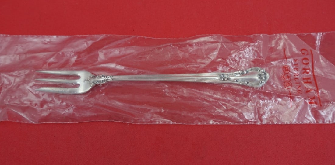 Sterling Silver Cocktail Fork Chantilly Pattern by Gorham Factory Sealed 5.5 Inch: Sterling Silver Cocktail Fork Chantilly Pattern by Gorham Factory Sealed 5.5 Inch This Gorham Chantilly cocktail fork is crafted from sterling silver and measures 5 1/2 inches in length. It is unused 