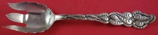 Tiffany and Co Ailanthus Sterling Silver Serving Fork Bright-Cut 6.5": Tiffany and Co Ailanthus Sterling Silver Serving Fork Bright-Cut 6.5" This exquisite serving fork, crafted by Tiffany and Co. in the Ailanthus pattern, dates back to 1850-1899. Made of high-quality st