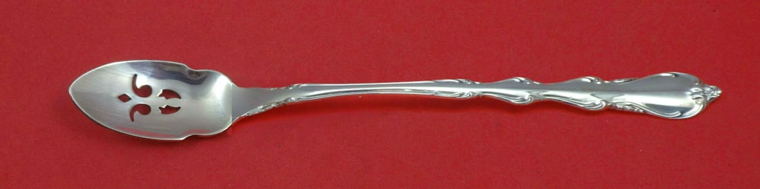 Custom Pierced Olive Spoon Angelique Pattern by International Sterling Silver 7 1/8": Custom Pierced Olive Spoon Angelique Pattern by International Sterling Silver 7 1/8" This exquisite olive spoon from the Angelique pattern by International is a beautiful addition to your serving coll