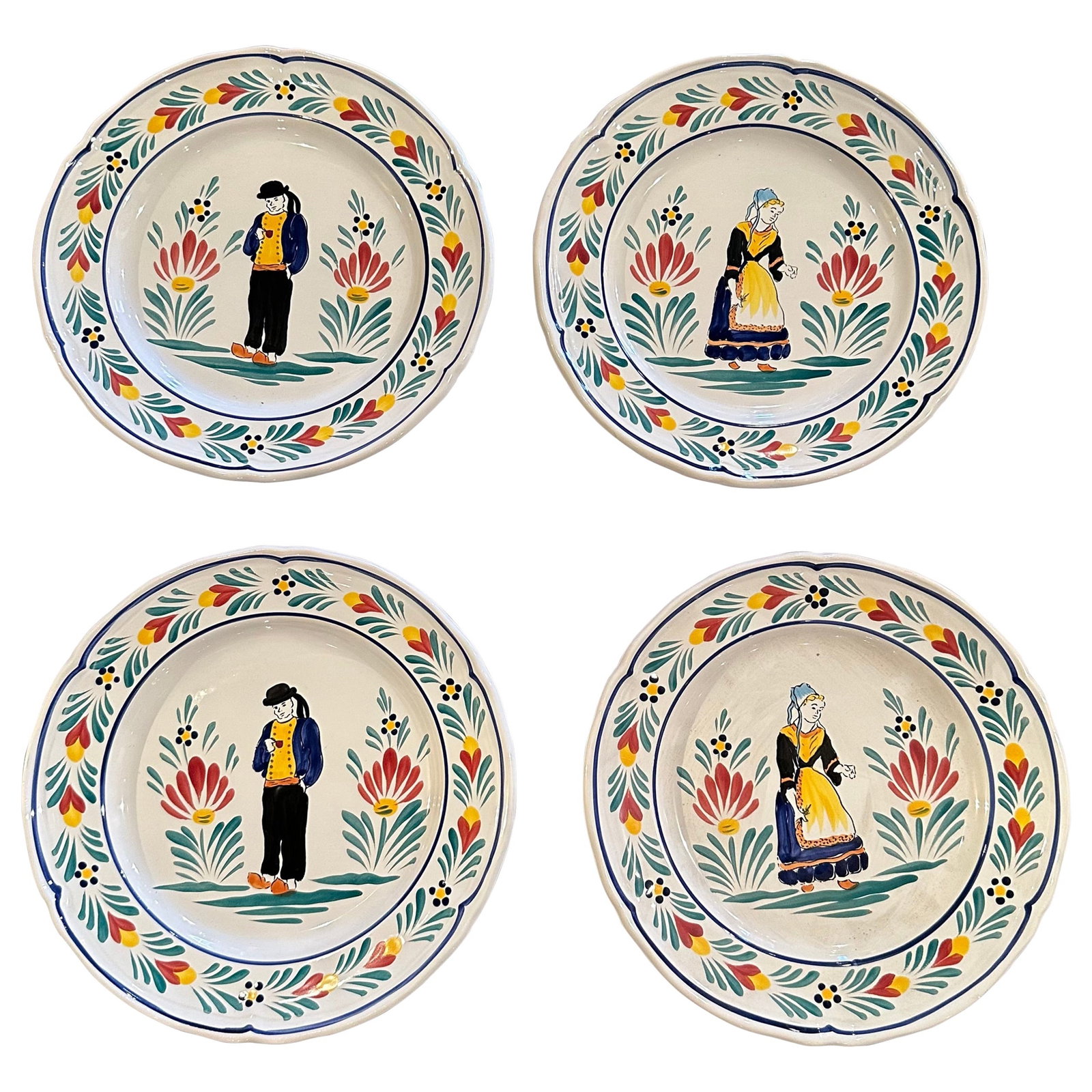 Set of 4 French Faience Plates Hand Painted Signed Pornic Quimper Style: Set of 4 French Faience Plates Hand Painted Signed Pornic Quimper Style This set of four Mid-Century French hand-painted Quimper plates showcases traditional Breton people in vibrant costumes, crafted