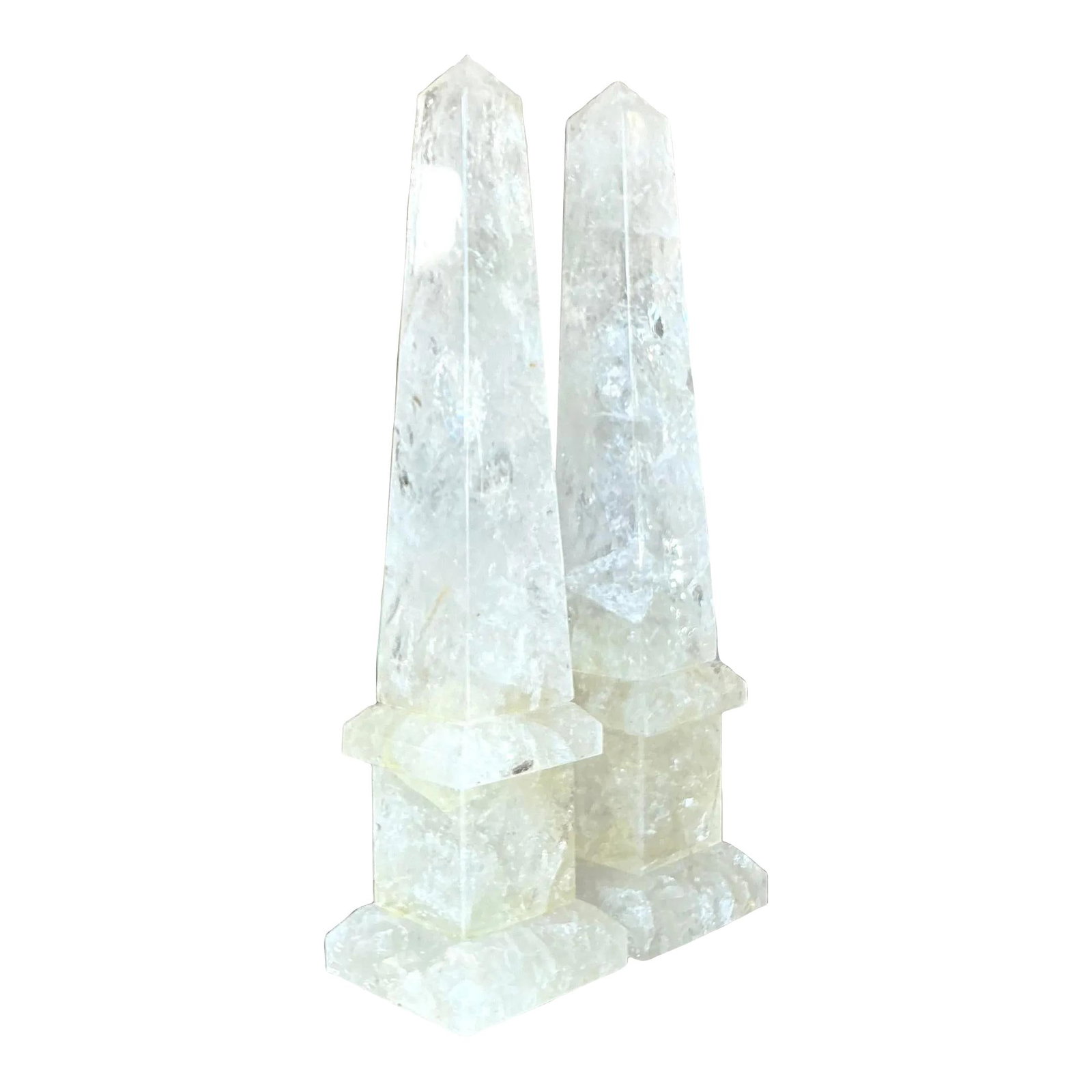 Pair of Vintage Boho Rock Crystal Obelisks 20 in: Pair of Vintage Boho Rock Crystal Obelisks 20 in This exquisite pair of vintage boho rock crystal obelisks radiates natural elegance and adds a sophisticated, organic touch to any space. Each obelisk 