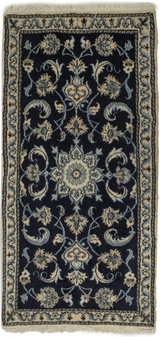 2'3X4'7 ft Nain wool area rug navy floral hand-knotted: 2'3X4'7 ft Nain wool area rug navy floral hand-knotted A pre-owned small Nain oriental rug featuring a classic navy floral design and a thick pile. The rug measures 2'3 x 4'7 ft. Specifications Item T