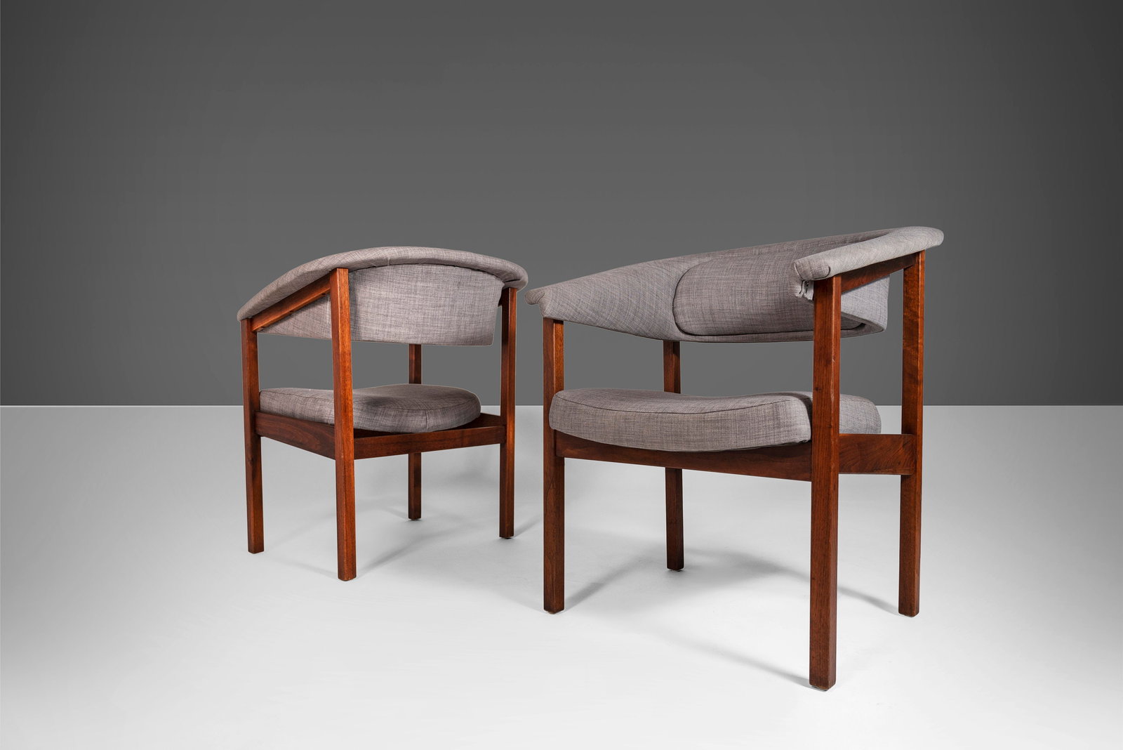 Mid-Century Barrel Arm Chairs by Arthur Umanoff for Madison 1960s Walnut Frame Gray Knit Fabric: Mid-Century Barrel Arm Chairs by Arthur Umanoff for Madison 1960s Walnut Frame Gray Knit Fabric This elegant pair of Barrel Arm Chairs, designed by Arthur Umanoff for Madison Furniture in the 1960s, s