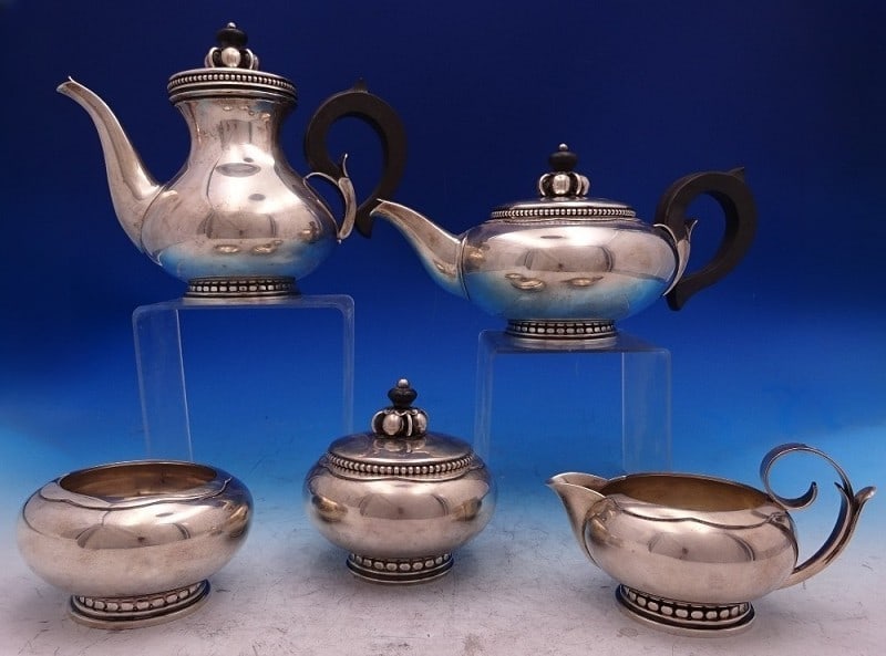 Five-Piece La Paglia Sterling Silver Tea Set with Wooden Handles: Five-Piece La Paglia Sterling Silver Tea Set with Wooden Handles This exceptional La Paglia five-piece tea and coffee set by International features sterling silver construction with elegant wood handl