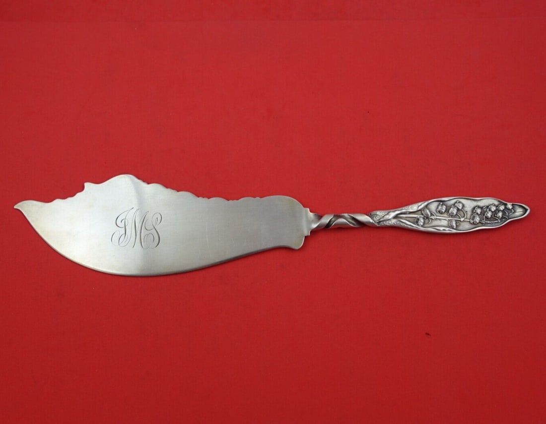 Whiting Sterling Silver 13 Ice Cream Slice Lily of the Valley: Whiting Sterling Silver 13 Ice Cream Slice Lily of the Valley Presenting the exquisite "Lily of the Valley" ice cream slice by Whiting, crafted from high-quality sterling silver. This elegant serving 