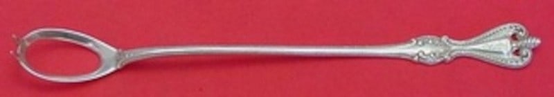 Towle Old Colonial Sterling Silver Olive Serving Spoon 8 Inch: Towle Old Colonial Sterling Silver Olive Serving Spoon 8 Inch A sterling silver olive spoon in the Old Colonial pattern by Towle. The piece features graceful curves and a beaded handle, and is describ