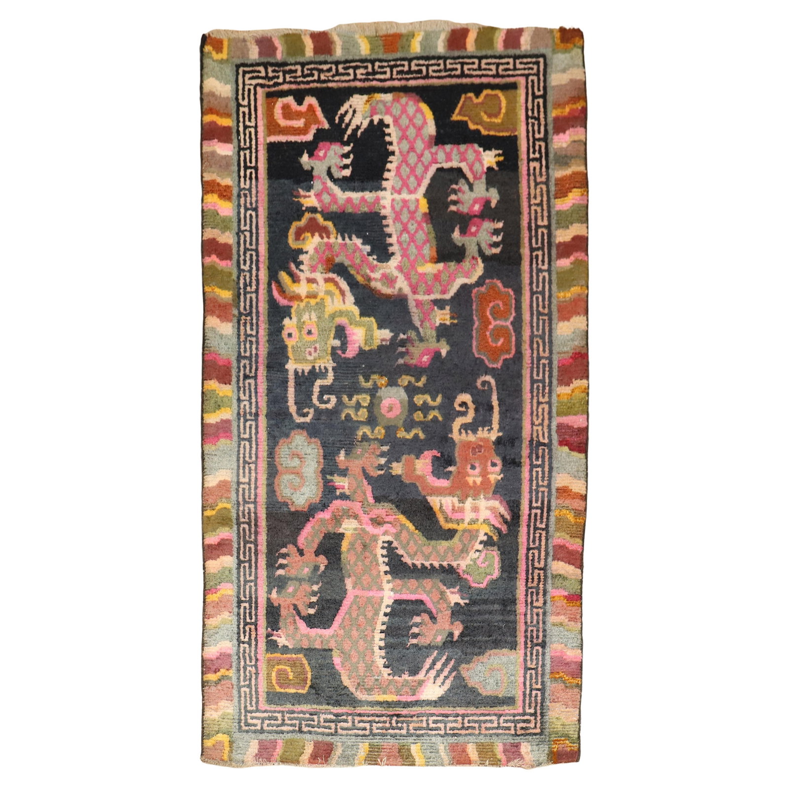 Vibrant Dragon Motif Early 20th Century Tibetan Hand-Woven Rug: Vibrant Dragon Motif Early 20th Century Tibetan Hand-Woven Rug This vibrant Tibetan rug from the early 20th century features a striking large-scale dragon motif, reflecting a traditional archaistic st