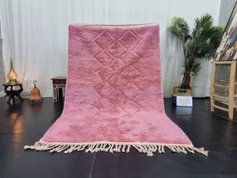 Authentic Handmade Pink Moroccan Berber Wool Rug 9.84 x 6.56 Feet: Authentic Handmade Pink Moroccan Berber Wool Rug 9.84 x 6.56 Feet Enhance your decor with this authentic Soft Pink Handmade Moroccan Berber Area Wool Rug. Featuring an elegantly engraved geometric pat
