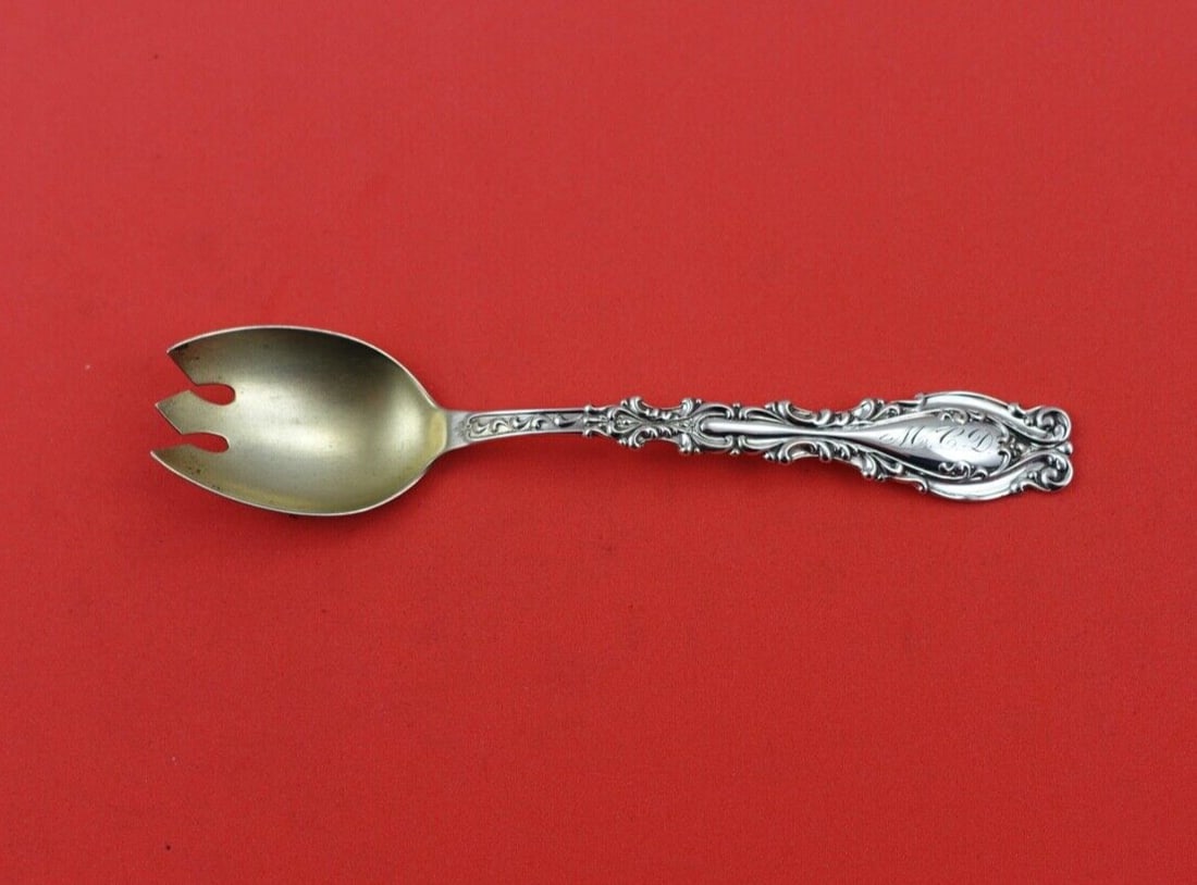 Frank Whiting Josephine Sterling Silver Ice Cream Fork Gold Washed 5 1/8": Frank Whiting Josephine Sterling Silver Ice Cream Fork Gold Washed 5 1/8" Indulge in a touch of elegance with the Josephine ice cream fork by Frank Whiting. This exquisite piece, crafted from sterling