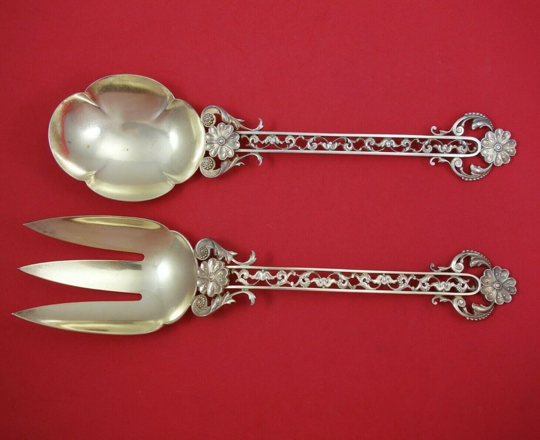 Shiebler Sterling Silver 2pc Salad Serving Set Vermeil Cast Flowers: Shiebler Sterling Silver 2pc Salad Serving Set Vermeil Cast Flowers This exquisite Shiebler Sterling Silver Salad Serving Set features a stunning 2-piece design, each measuring 11 1/4". Crafted from h