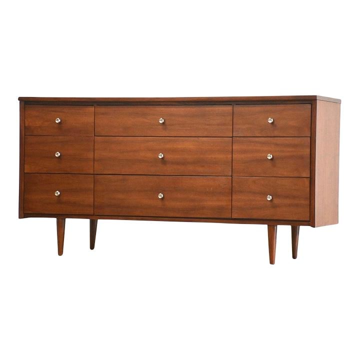 Mid Century Walnut Dresser by Harmony House 9 Drawers: Mid Century Walnut Dresser by Harmony House 9 Drawers Experience the elegance of mid-century modern design with this refinished walnut dresser by Harmony House. Featuring nine spacious drawers adorned