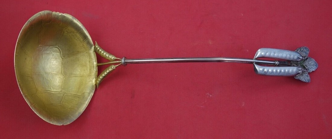 Peapod Sterling Silver Soup Ladle Gold Wash Turtleshell Bowl 14 1/4": Peapod Sterling Silver Soup Ladle Gold Wash Turtleshell Bowl 14 1/4" This exquisite Peapod soup ladle showcases a stunning combination of sterling silver and a gold-washed turtleshell bowl. Measuring 
