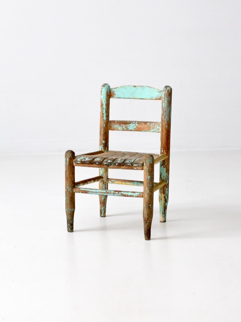 Vintage Early 20th Century Children's Wooden Chair Turquoise Yellow Paint: Vintage Early 20th Century Children's Wooden Chair Turquoise Yellow Paint This vintage children's chair, hailing from the early 20th century, showcases charming design elements that make it a delightf