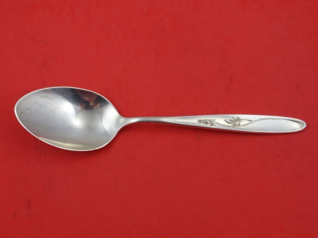 Towle Sterling Silver Serving Spoon Rose Solitaire 8 5/8 Inch: Towle Sterling Silver Serving Spoon Rose Solitaire 8 5/8 Inch This exquisite serving spoon features the elegant Rose Solitaire pattern by Towle. Crafted from high-quality sterling silver, this piece m
