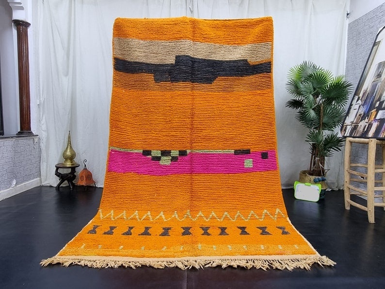 Authentic Handmade Orange Moroccan Berber Wool Rug 10 x 5 Feet: Authentic Handmade Orange Moroccan Berber Wool Rug 10 x 5 Feet Enhance your space with this Authentic Stunning Orange Handmade Moroccan Berber Wool Rug. Skillfully crafted by local Berber women weaver