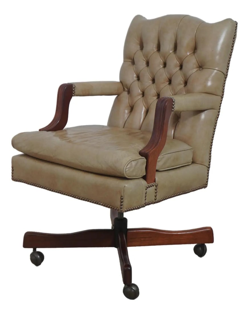 Traditional Mahogany Desk Chair with Tufted Leather and Brass Casters: Traditional Mahogany Desk Chair with Tufted Leather and Brass Casters Classic leather tufted rolling desk chair with a traditional style and high quality construction. It features a tufted back, nice 
