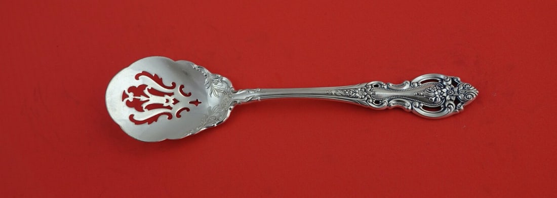 Wallace Grand Victorian Sterling Silver Nut Spoon 6.5": Wallace Grand Victorian Sterling Silver Nut Spoon 6.5" This exquisite 6 1/2" nut spoon is crafted from sterling silver and features the elegant Grand Victorian pattern by Wallace. This serving spoon, 