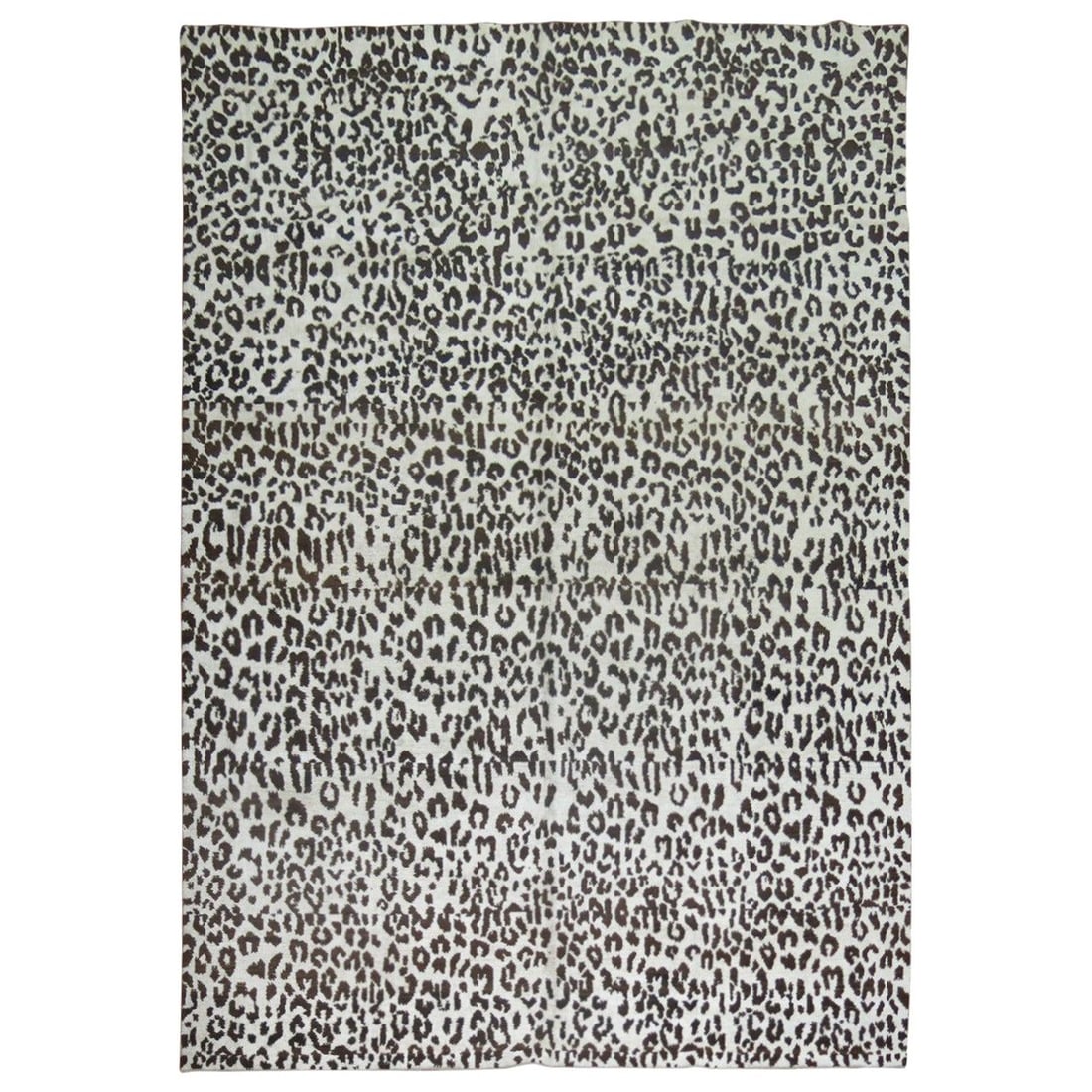 Vintage Inspired Leopard Turkish Silk and Wool Hand-Woven Rug: Vintage Inspired Leopard Turkish Silk and Wool Hand-Woven Rug This stunning Leopard Vintage Inspired Turkish Silk Rug is a unique addition to any space, featuring an all-over leopard motif crafted fro