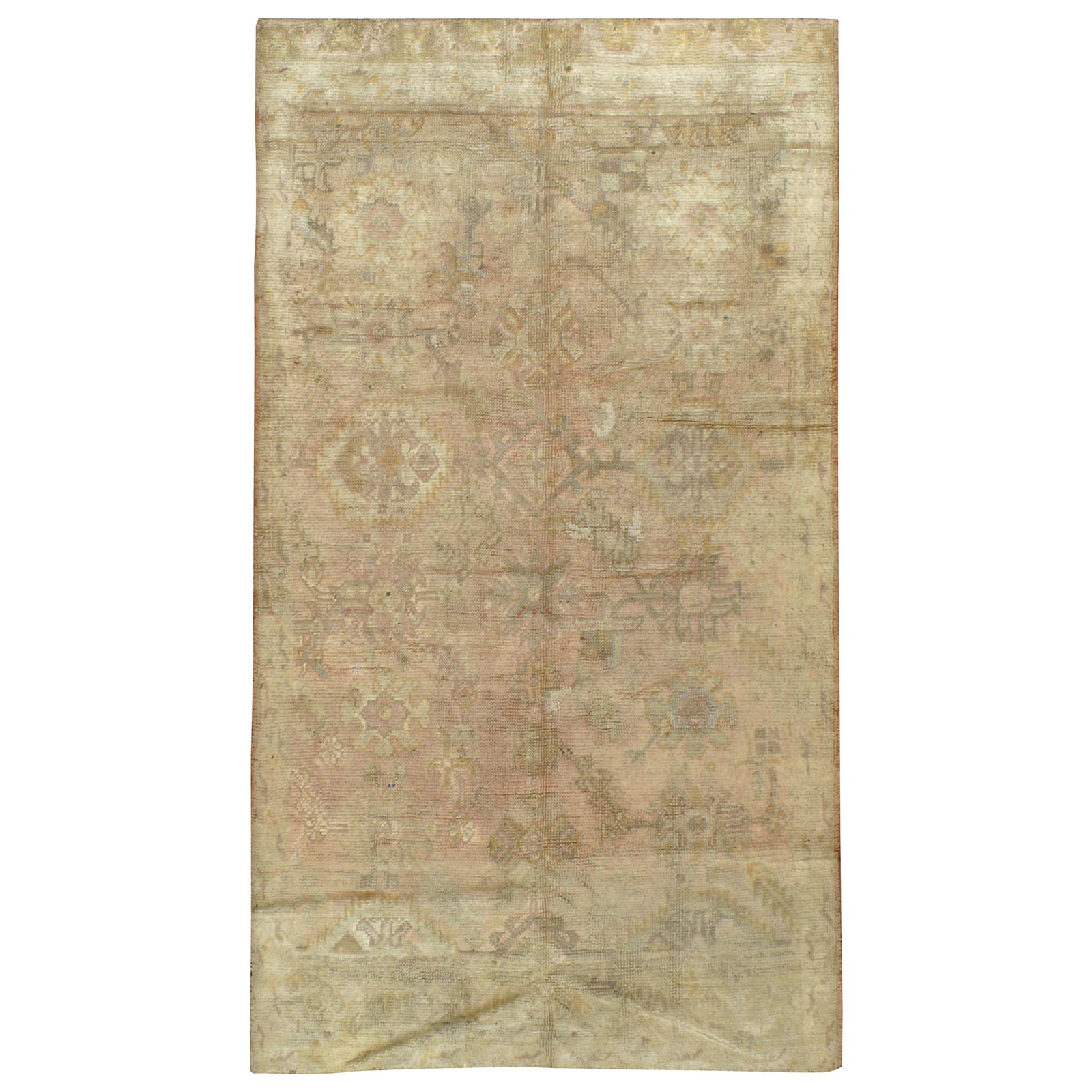 1930s Turkish Oushak Wool Hand Woven Rug 56 x 100 in: 1930s Turkish Oushak Wool Hand Woven Rug 56 x 100 in This antique Oushak rug from the 1930s features a hand-woven wool construction and displays pale colors characteristic of traditional Turkish craft
