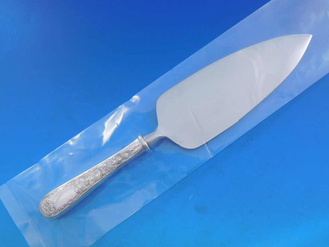 Kirk Old Maryland Engraved Sterling Silver Cake Server 10 1/8 Inches: Kirk Old Maryland Engraved Sterling Silver Cake Server 10 1/8 Inches This exquisite cake server features the Old Maryland Engraved pattern crafted by Kirk. Made from high-quality sterling silver, it h