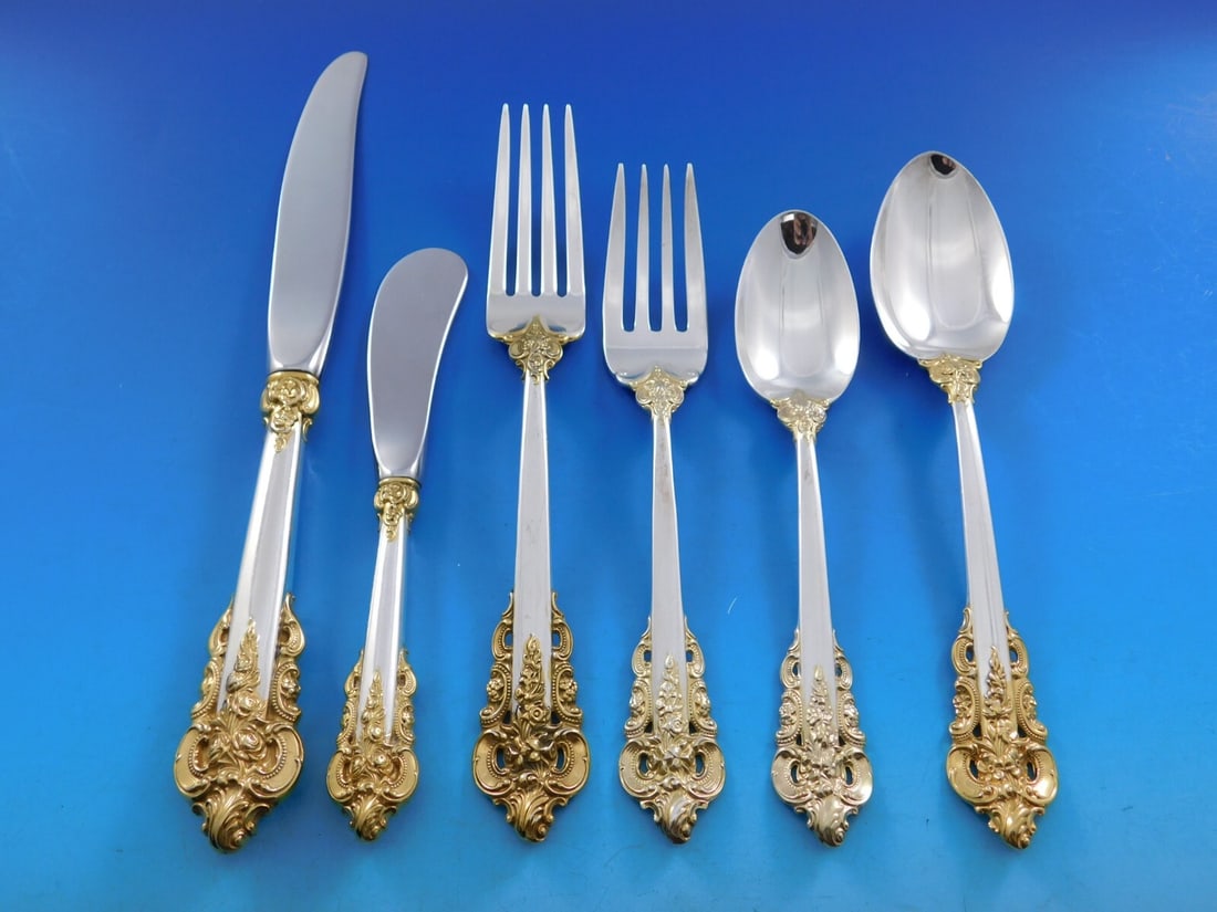 Wallace Grande Baroque Gold Accent Sterling Silver Flatware Set 79 pcs for 12: Wallace Grande Baroque Gold Accent Sterling Silver Flatware Set 79 pcs for 12 Experience the elegance of the Grande Baroque Gold Accent flatware set by Wallace, crafted from high-quality sterling silv
