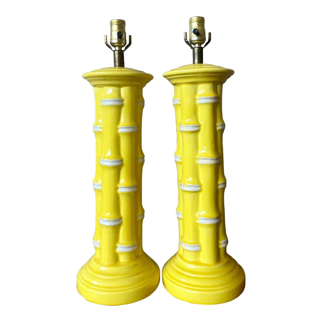 Pair of Yellow Ceramic Table Lamps with Bamboo Motif and Glazed Finish: Pair of Yellow Ceramic Table Lamps with Bamboo Motif and Glazed Finish This pair of vintage table lamps features ceramic bodies designed to resemble bundled bamboo stalks, finished in a vibrant lemon 