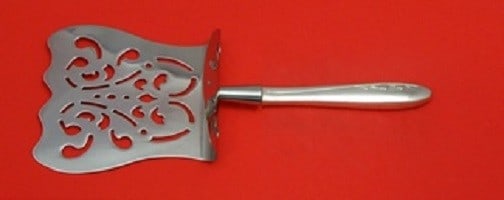 Lunt Sterling Silver Spring Serenade Asparagus Server 9.5 Inch: Lunt Sterling Silver Spring Serenade Asparagus Server 9.5 Inch Enhance your dining experience with the exquisite Spring Serenade Asparagus Server from Lunt. Crafted from high-quality sterling silver, 
