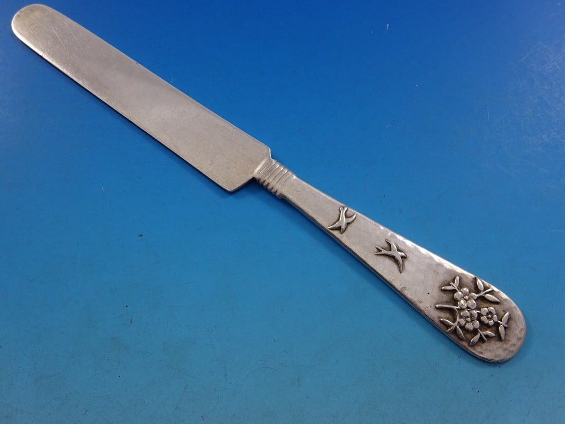 Shiebler Hammered Sterling Silver Tea Knife with Birds and Forget-Me-Nots: Shiebler Hammered Sterling Silver Tea Knife with Birds and Forget-Me-Nots Discover the exquisite craftsmanship of this Hammered and Applied Tea Knife by Shiebler, a stunning example of sterling silver