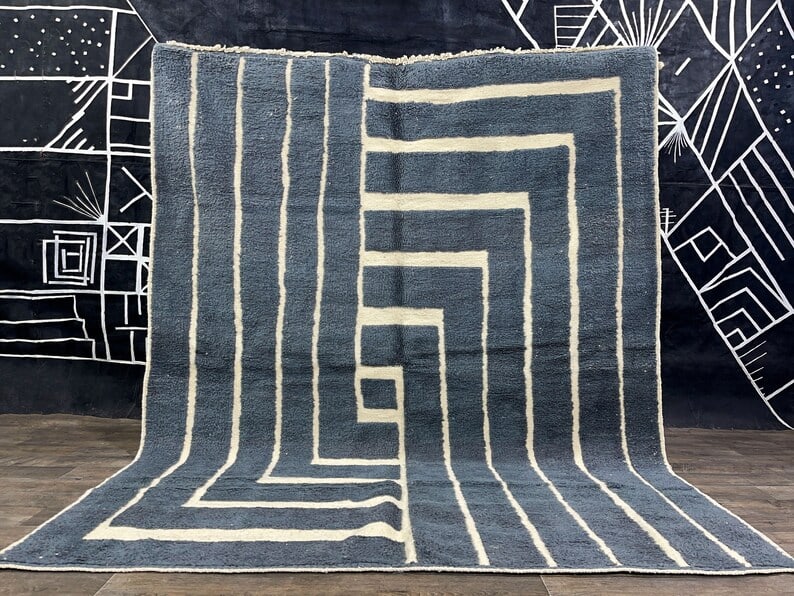 Authentic Soft Grey Moroccan Engraved Wool Rug 9.84 x 6.56 feet: Authentic Soft Grey Moroccan Engraved Wool Rug 9.84 x 6.56 feet Experience the beauty of Moroccan craftsmanship with this stunning soft grey handmade wool rug. Expertly handwoven by local Berber women