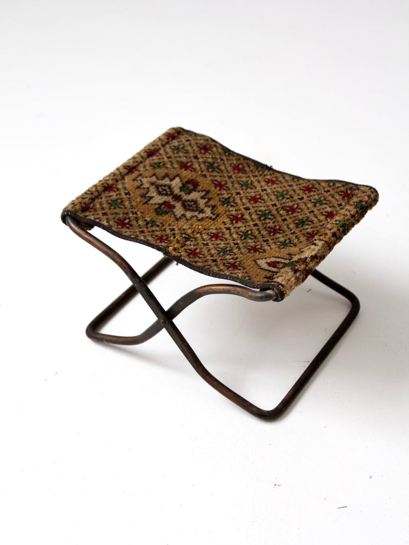 Victorian carriage stool with iron folding frame woven wool seat: Victorian carriage stool with iron folding frame woven wool seat Antique Victorian carriage stool with a low folding design for overflow seating in a buggy. It features an iron frame and a rich woven 