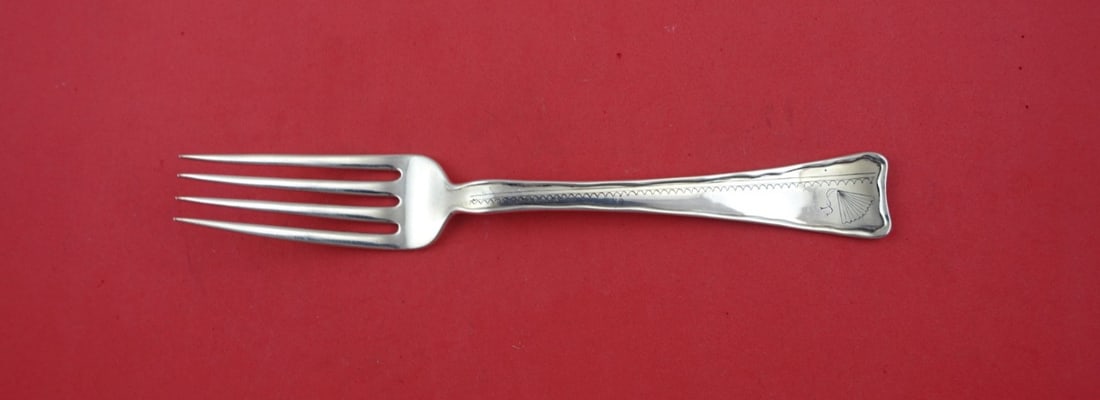Tiffany & Co. Lap Over Edge Hand Engraved Sterling Silver Dinner Fork 8": Tiffany & Co. Lap Over Edge Hand Engraved Sterling Silver Dinner Fork 8" This exquisite dinner fork is a stunning example of Tiffany & Co.'s craftsmanship, featuring the elegant Lap Over Edge Hand Eng