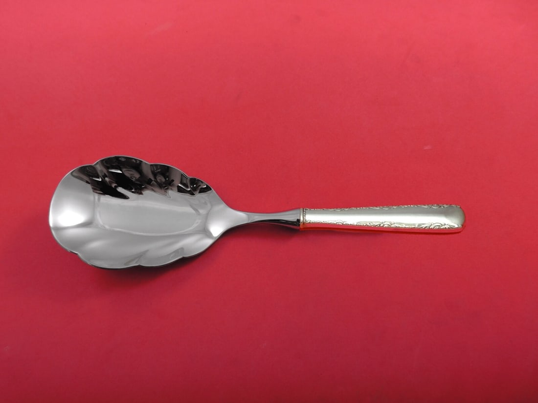 Gorham Camellia Sterling Silver 10 Inch Rice Spoon: Gorham Camellia Sterling Silver 10 Inch Rice Spoon This is a custom-made rice spoon in the Camellia pattern by Gorham. It features a sterling silver hollow handle and a stainless implement with a scal