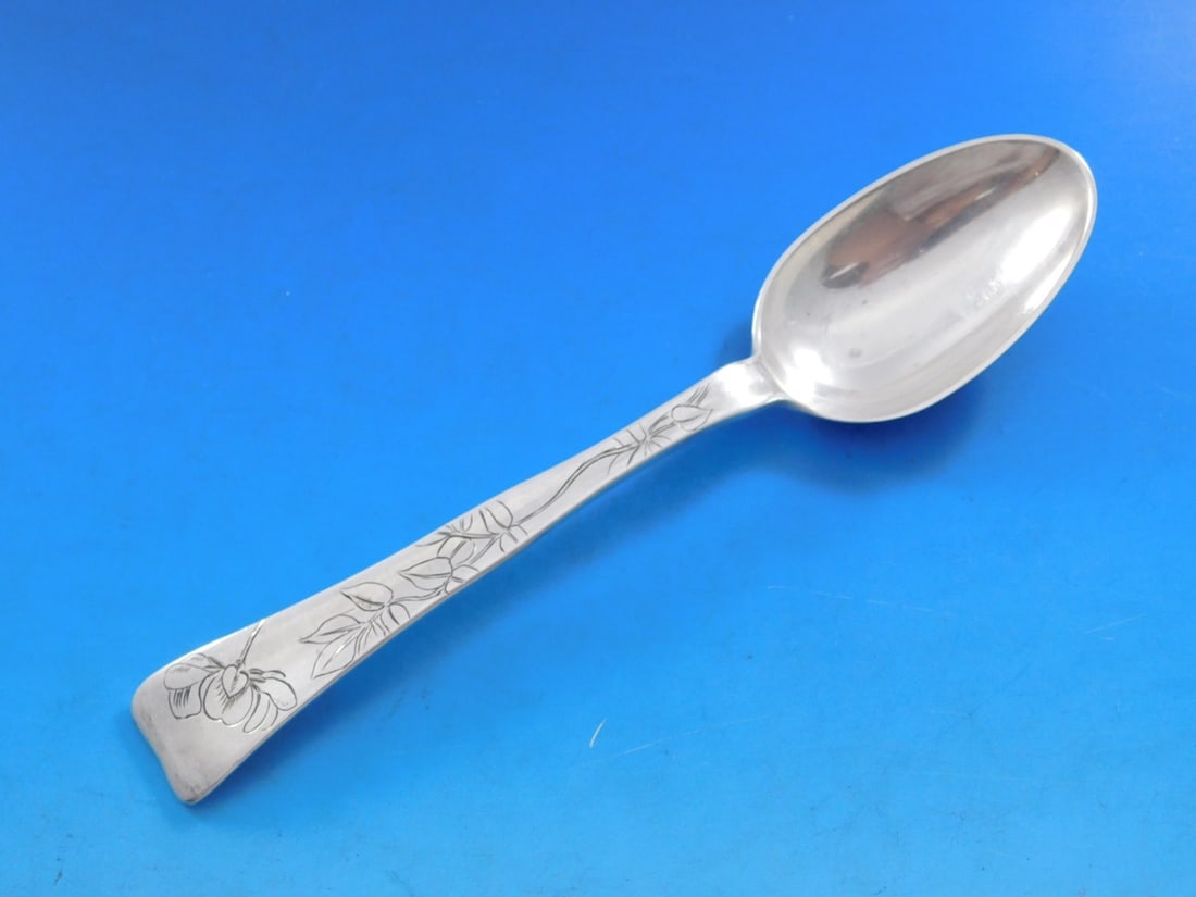 Tiffany & Co. Sterling Silver Soup Spoon 7" Large Orchid Lap Over Edge: Tiffany & Co. Sterling Silver Soup Spoon 7" Large Orchid Lap Over Edge This exquisite soup spoon features the Lap Over Edge pattern, skillfully crafted in sterling silver by Tiffany & Co. The spoon sh