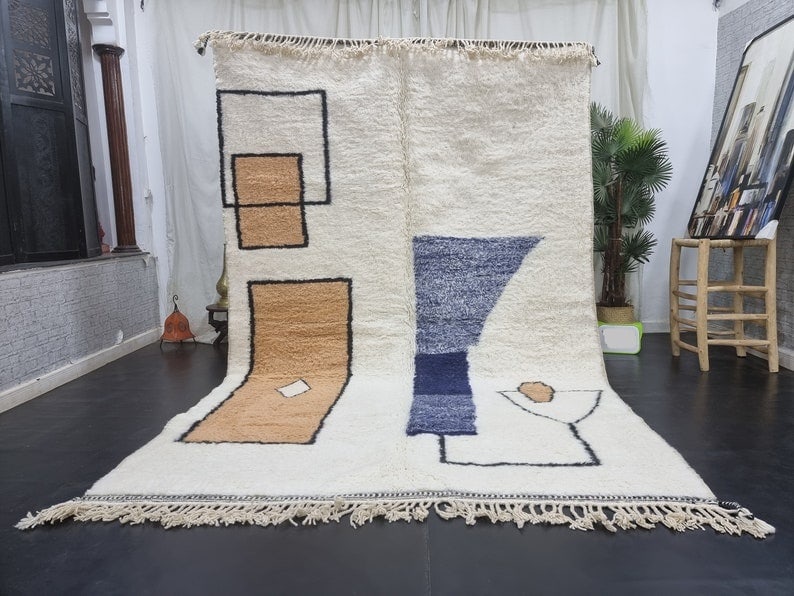 Authentic Handwoven Moroccan Berber Wool Rug 9.84 x 6.56 Feet: Authentic Handwoven Moroccan Berber Wool Rug 9.84 x 6.56 Feet Discover the elegance of this Authentic Soft Handmade Moroccan Berber Rug, masterfully crafted from 100% local sheep wool. This exquisite 