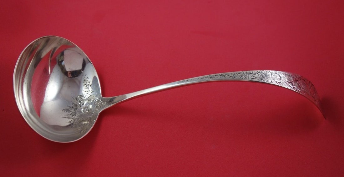 Antique Lily Engraved Sterling Silver Soup Ladle 11.5 inches 5.2 oz: Antique Lily Engraved Sterling Silver Soup Ladle 11.5 inches 5.2 oz This exquisite Antique Lily Engraved Soup Ladle showcases a beautiful design crafted in sterling silver. Measuring 11 1/2 inches in 