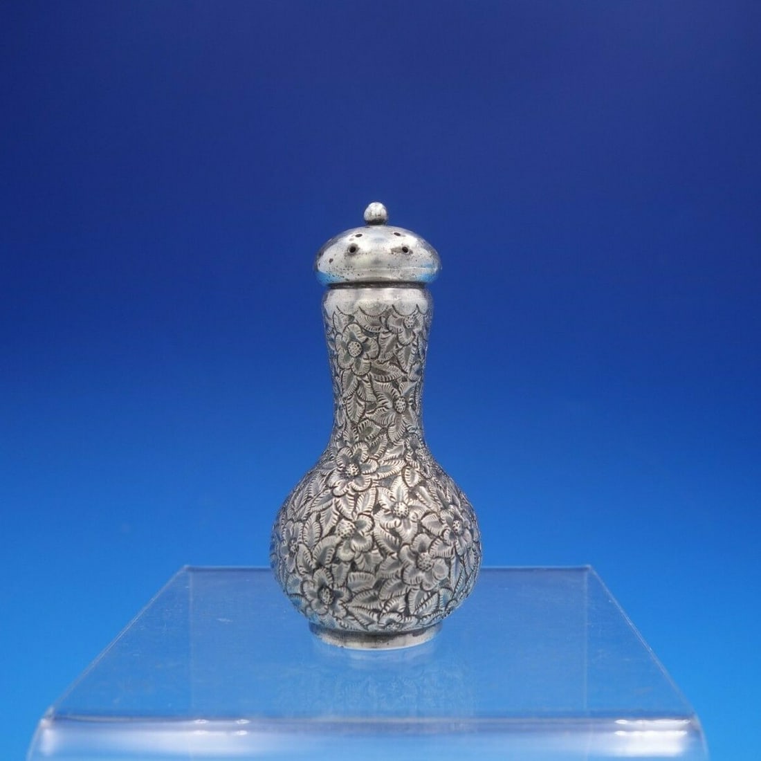 Dominick & Haff Repousse Sterling Silver Salt Shaker 3 3/8 Inches: Dominick & Haff Repousse Sterling Silver Salt Shaker 3 3/8 Inches This exquisite salt shaker is crafted by Dominick & Haff in the elegant Repousse style. Made from high-quality sterling silver, it fea