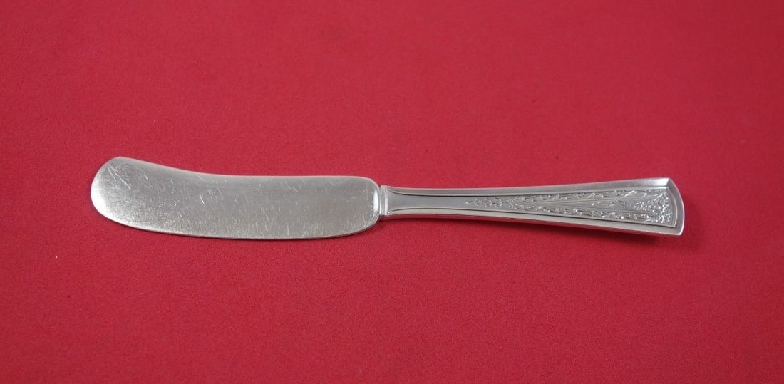 Dominick & Haff Queen Anne Engraved Sterling Silver Butter Spreader 5.5": Dominick & Haff Queen Anne Engraved Sterling Silver Butter Spreader 5.5" This exquisite Queen Anne Engraved butter spreader by Dominick & Haff is crafted from high-quality sterling silver. Featuring a