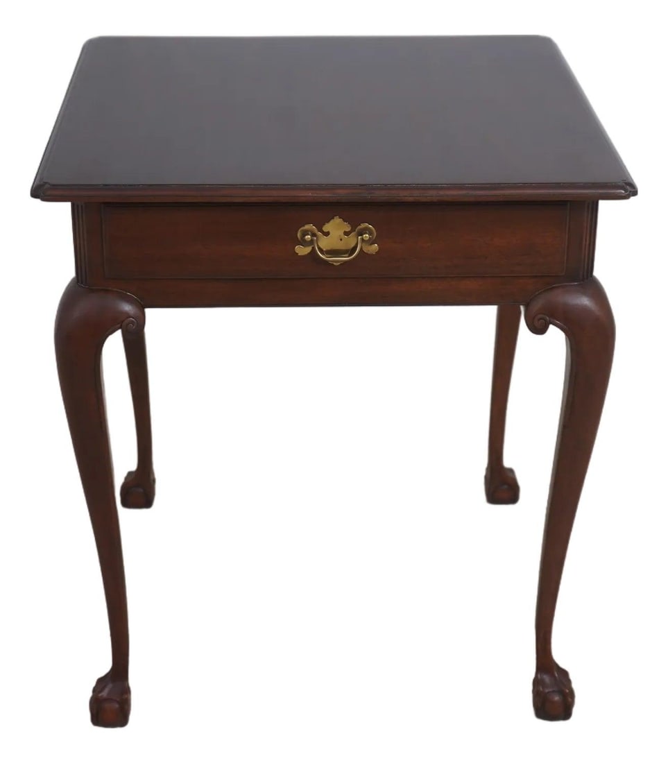 Mahogany Lamp Table with Ball and Claw Feet Chippendale Style: Mahogany Lamp Table with Ball and Claw Feet Chippendale Style This custom-made lamp table features a Chippendale-inspired design with ball and claw feet and traditional styling. Crafted approximately 