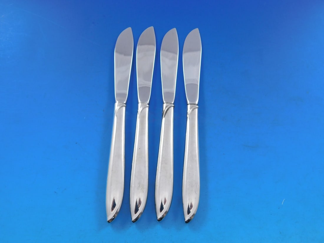 Set of 4 International Silver Rhythm Sterling Silver Butter Spreaders 6 1/4 inches: Set of 4 International Silver Rhythm Sterling Silver Butter Spreaders 6 1/4 inches Enhance your dining experience with this elegant set of four butter spreaders from the Silver Rhythm pattern by Inter