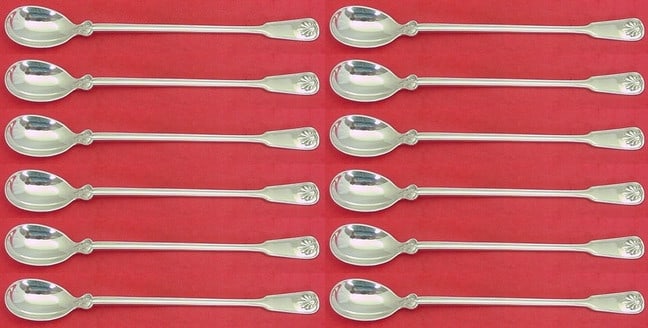 Tiffany & Co Shell and Thread Sterling Silver 12-Piece Iced Tea Spoon Set: Tiffany & Co Shell and Thread Sterling Silver 12-Piece Iced Tea Spoon Set Enhance your dining experience with this exquisite 12-piece iced tea spoon set from Tiffany & Co., featuring the elegant Shell