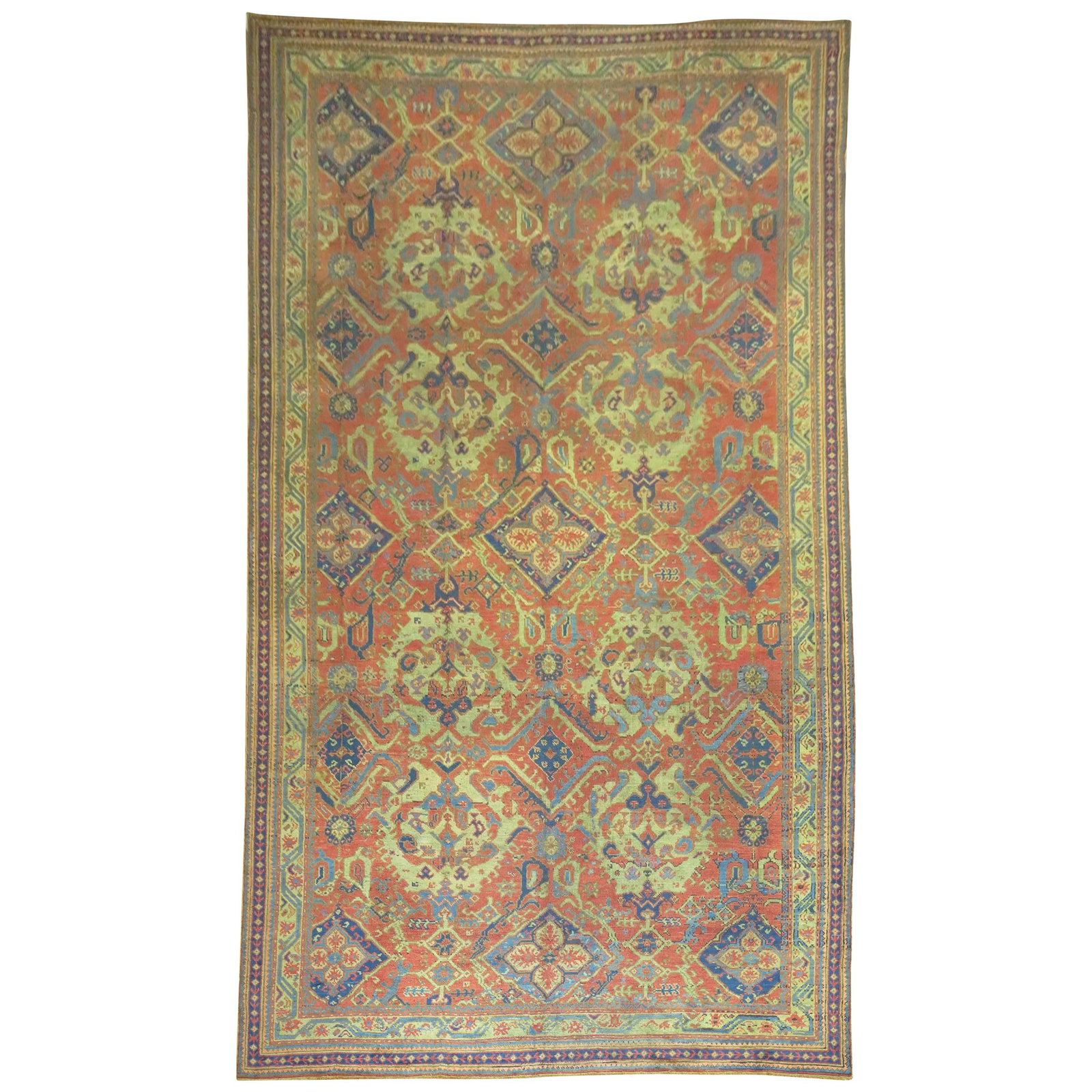 Oversize Antique Oushak Smyrna Rug 131 x 268 in Wool Hand-Woven Turkey: Oversize Antique Oushak Smyrna Rug 131 x 268 in Wool Hand-Woven Turkey This stunning oversize antique Oushak Smyrna rug is a remarkable piece from the early 20th century, crafted in Turkey around 1900