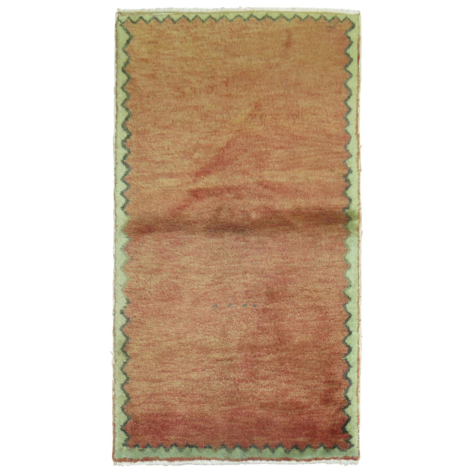 Unique Brick Red Hand-Woven Turkish Modernist Carpet 30 x 50: Unique Brick Red Hand-Woven Turkish Modernist Carpet 30 x 50 This unique mid-20th century Turkish modernist carpet showcases a stunning brick red color complemented by a soft green border. Hand-woven 